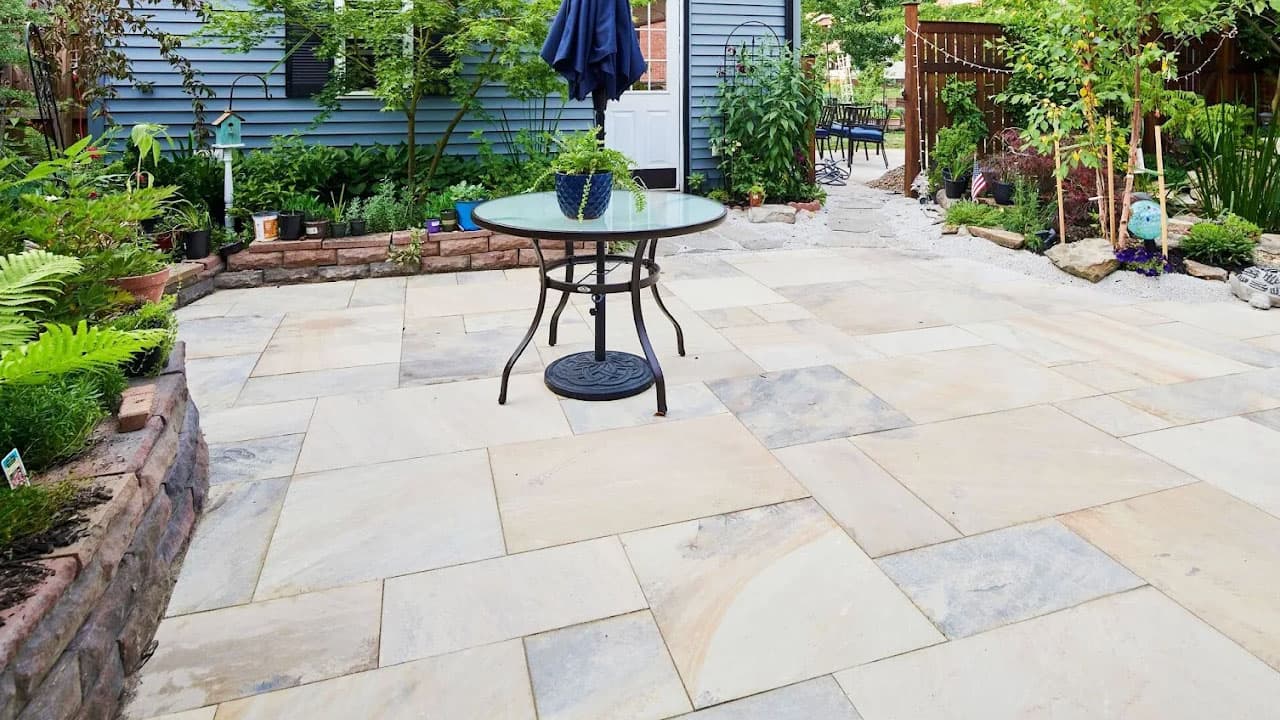 Paver patio installation in Cleveland with lighting wire sleeved before the surface is set