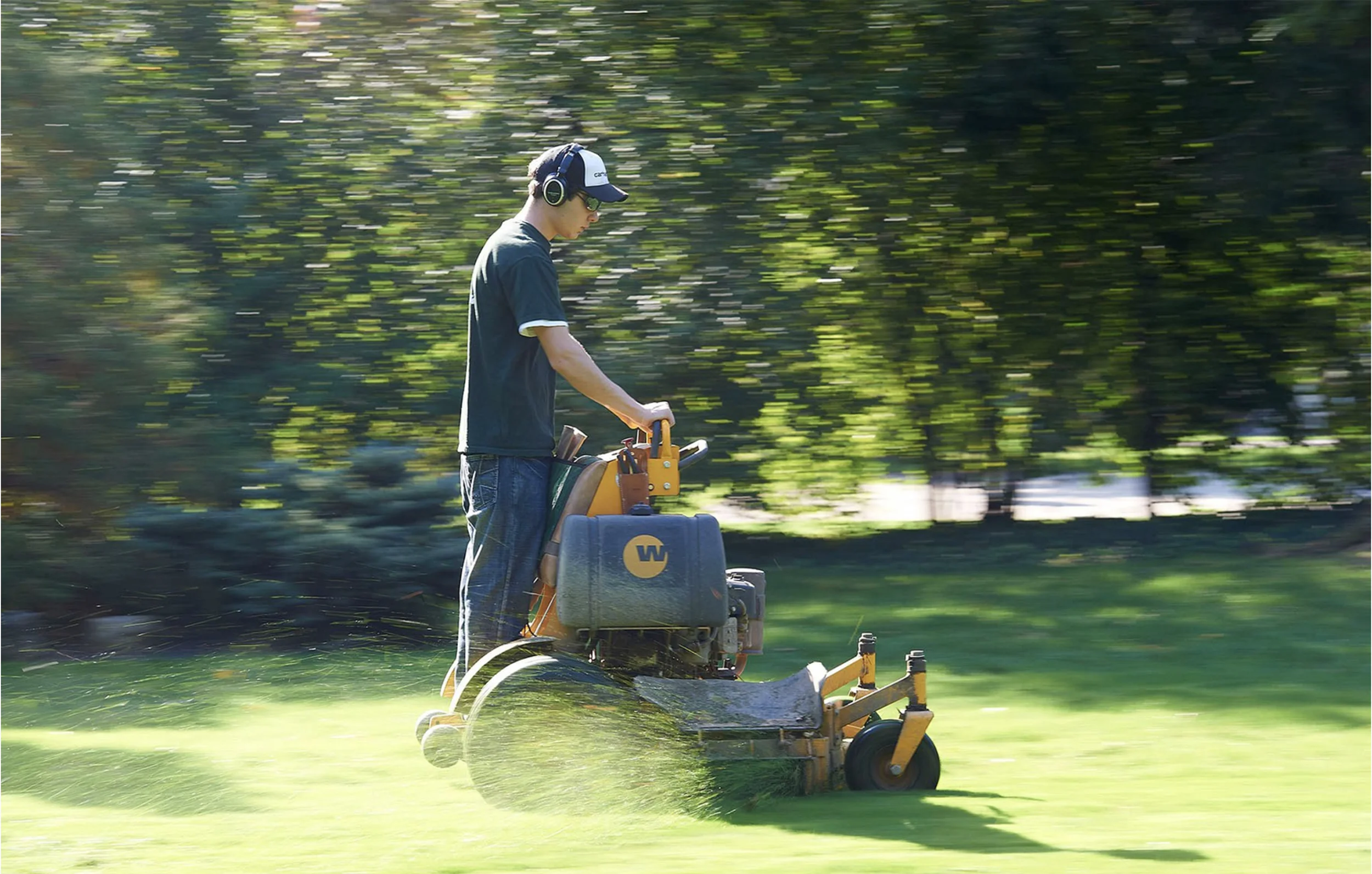 Mowing a property on a bright autumn afternoon